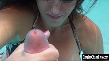 Sexy MILF Charlee Chase is going deep underwater when she holds her b. and starts stroking a hard cock until it shoots cum underwater! Exclusive video from CharleeChaseLive.com