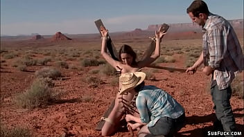 Couple of predators Maestro and Claire Adams bound hitchhiker Amber Rayne in a desert and then banged her throat and anal fucked her with dick on a stick